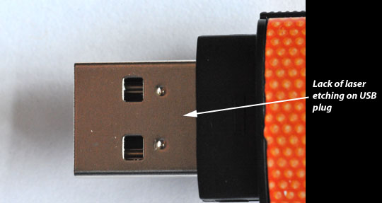 No laser etching of capacity or serial number on USB plug